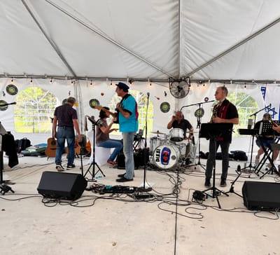 A band playing under the tent
